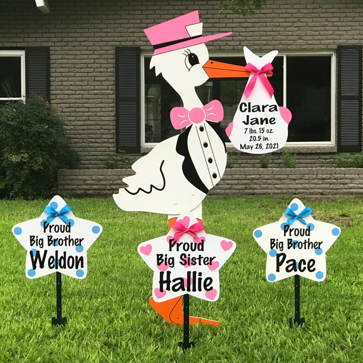 Pink Stork Sign with SIbling Stars: South Bay Storks - Stork Sign Rentals in Lee, Naples and Collier County, Florida